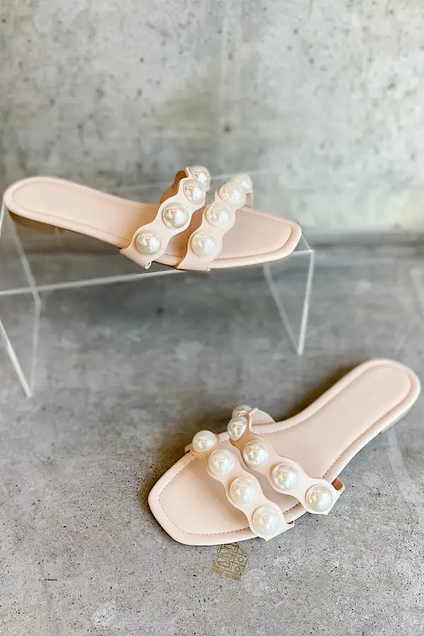 Sandals with pearls on 2025 them